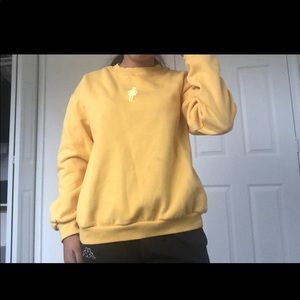 yellow sweatshirt